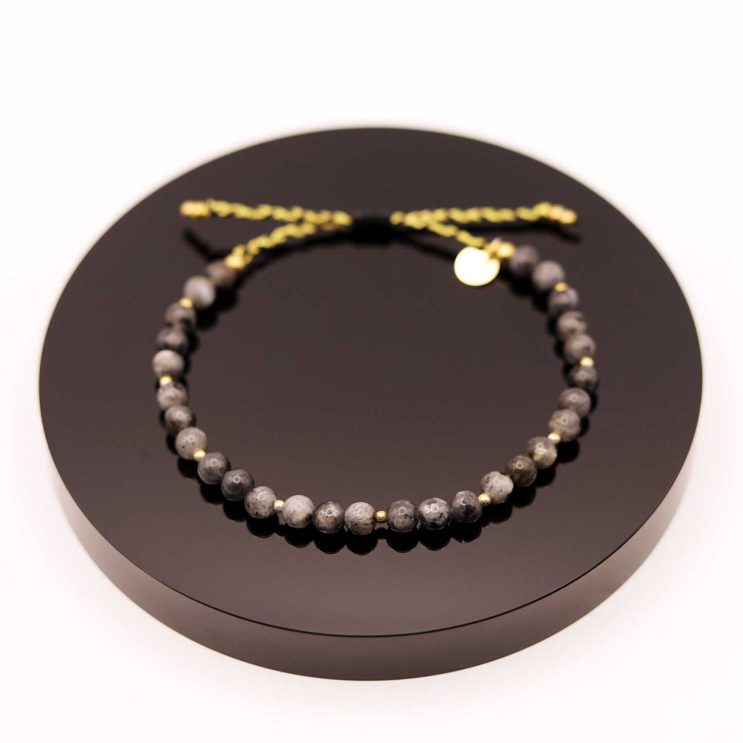 
                  
                    Pulsera Labradorita Negra Trenza
                  
                