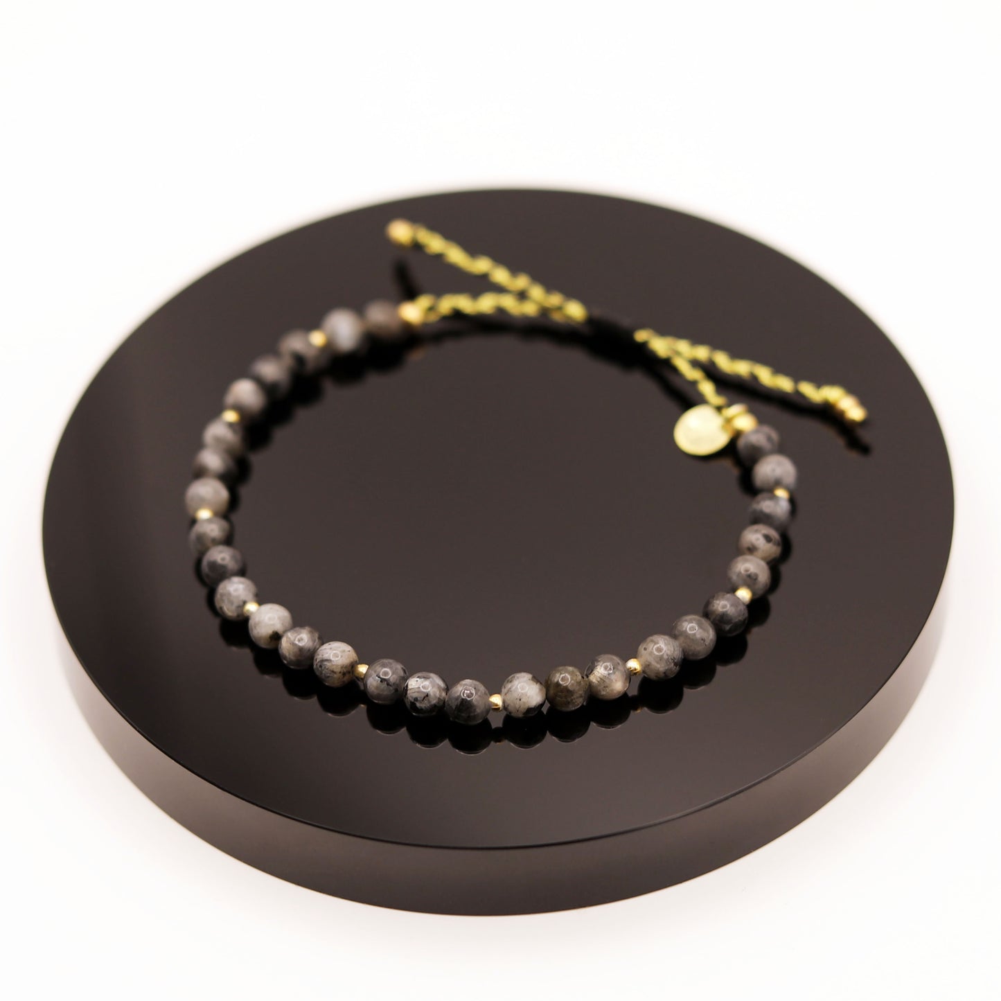 
                  
                    Pulsera Labradorita Negra Trenza
                  
                