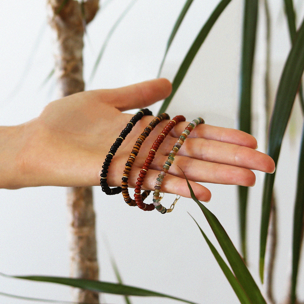 
                  
                    Pulsera Ojo de Tigre Plano
                  
                