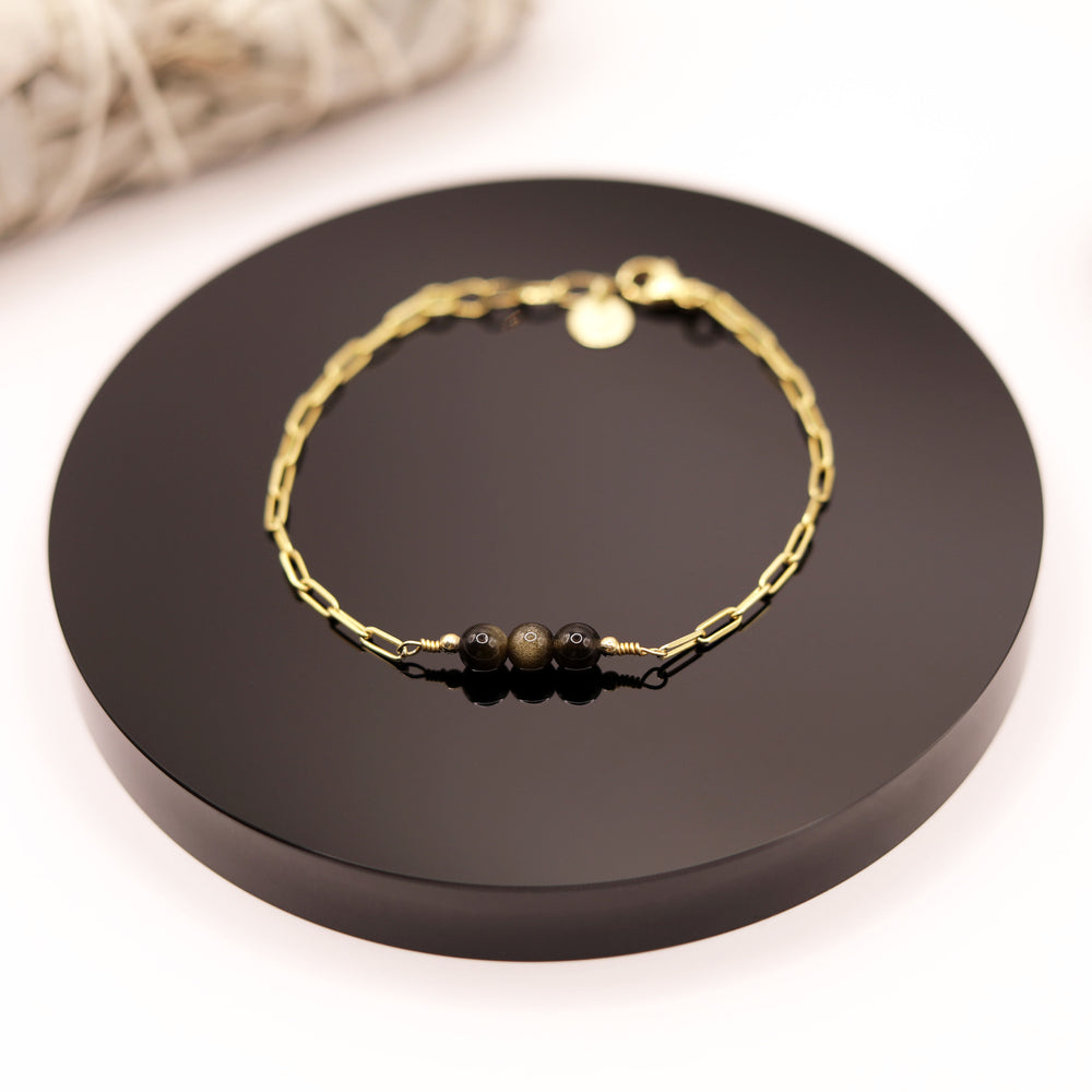 
                  
                    Pulsera Obsidiana Dorada Cadena
                  
                