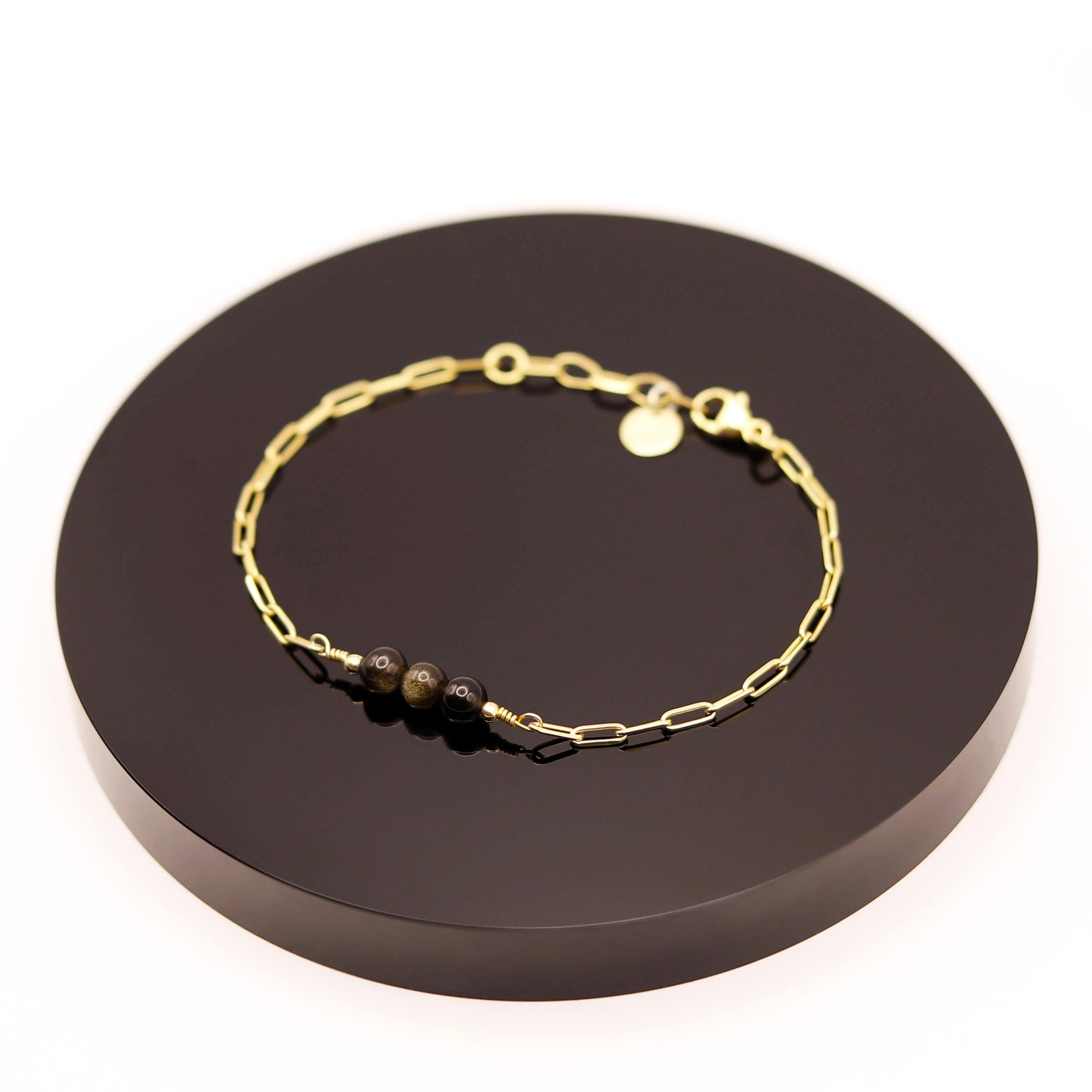 
                  
                    Pulsera Obsidiana Dorada Cadena
                  
                