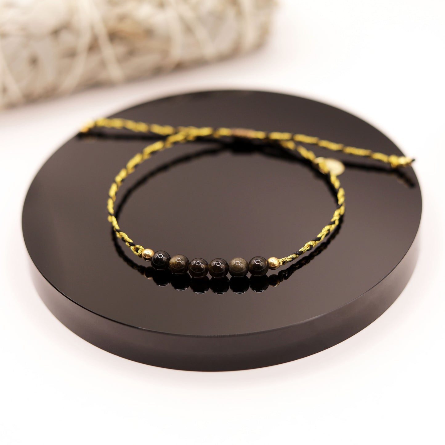 
                  
                    Pulsera Obsidiana Dorada Trenza
                  
                