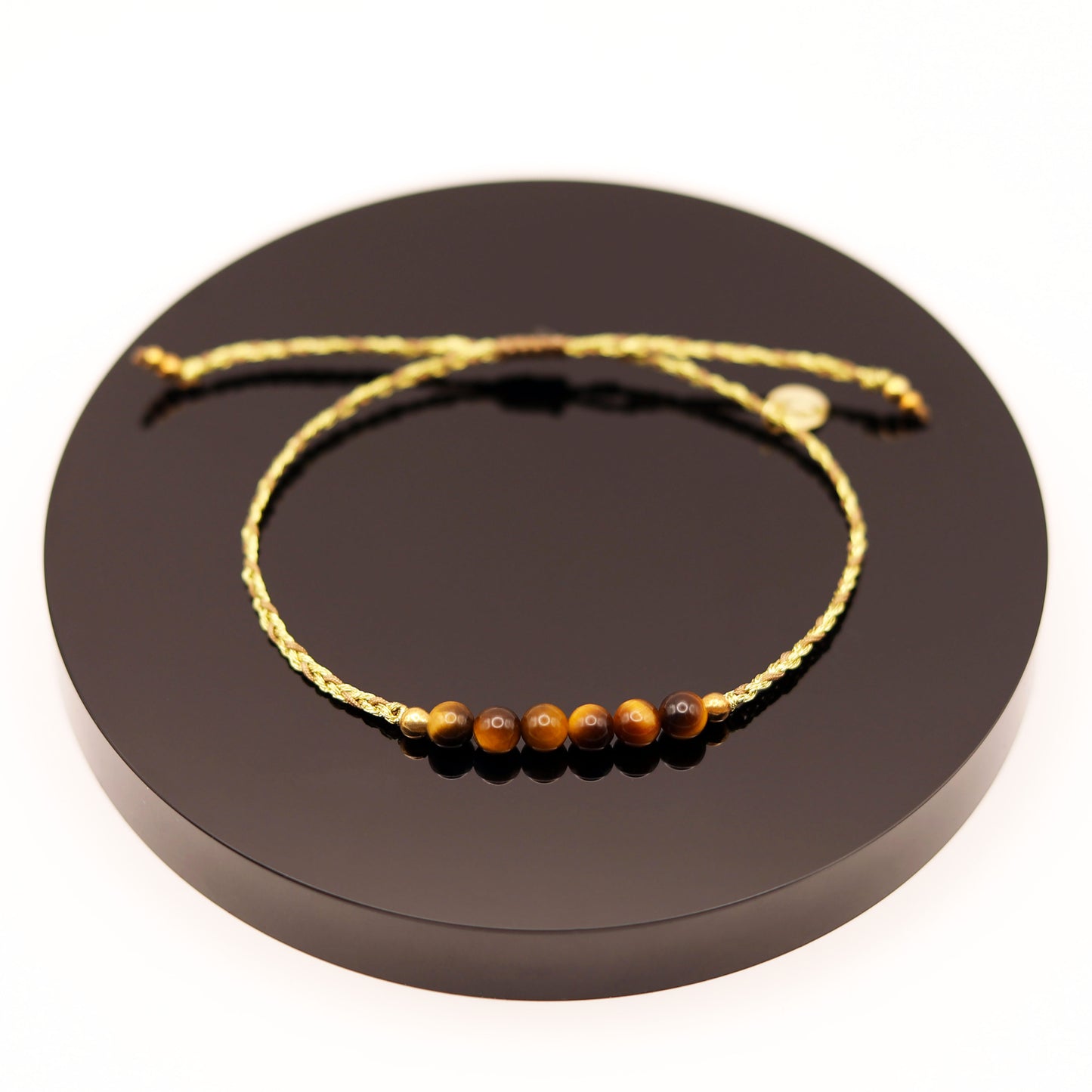 
                  
                    Pulsera Ojo de Tigre Trenza
                  
                