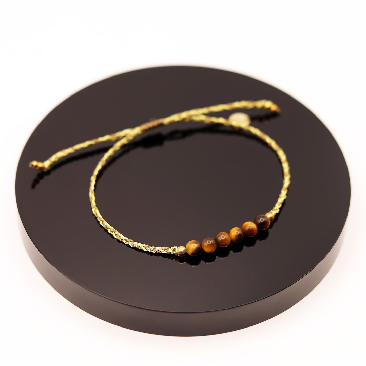 
                  
                    Pulsera Ojo de Tigre Trenza
                  
                