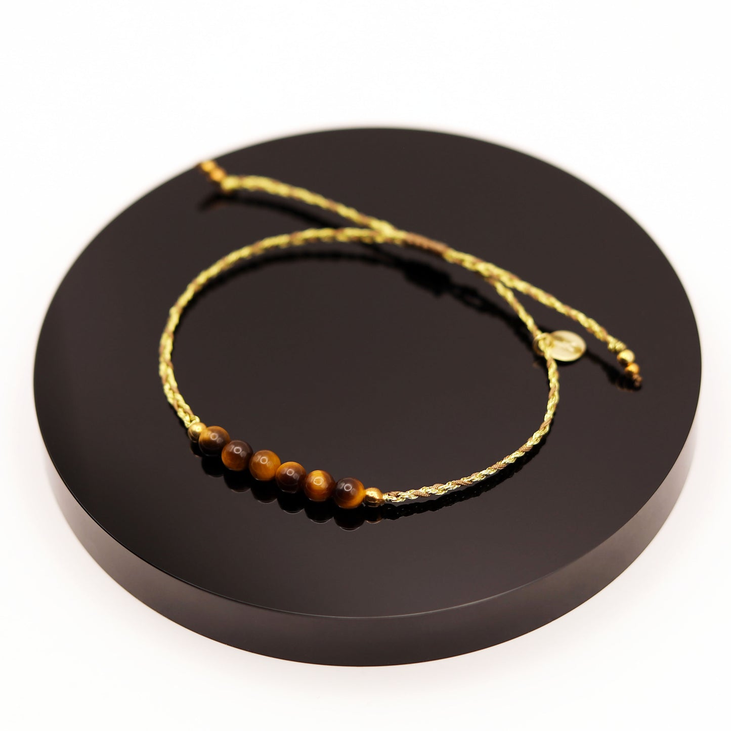 
                  
                    Pulsera Ojo de Tigre Trenza
                  
                