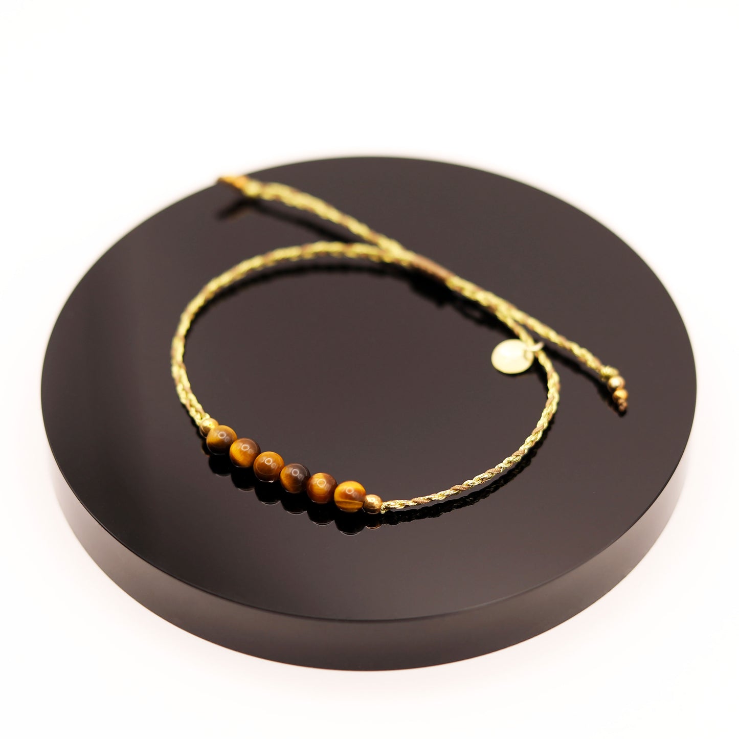 
                  
                    Pulsera Ojo de Tigre Trenza
                  
                