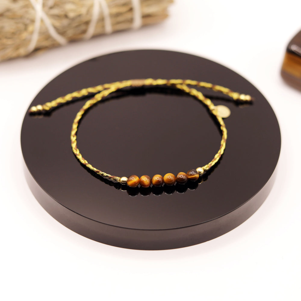 
                  
                    Pulsera Ojo de Tigre Trenza
                  
                