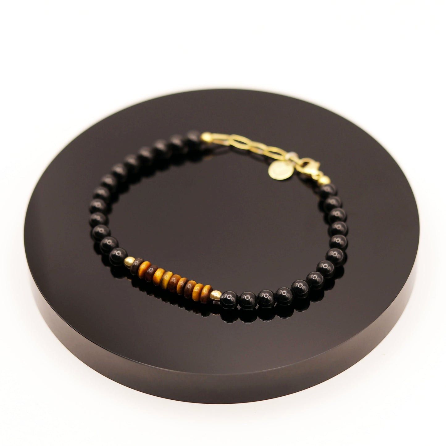 
                  
                    Pulsera Ojo de Tigre y Turmalina
                  
                