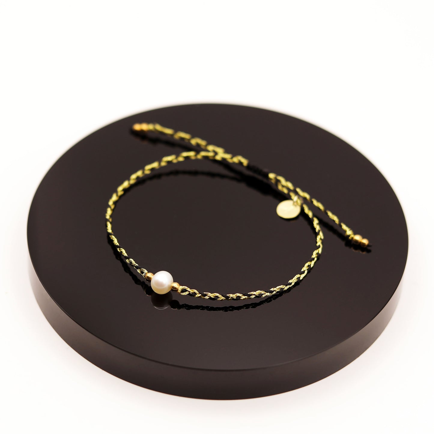 
                  
                    Pulsera Perla Trenza Negra
                  
                