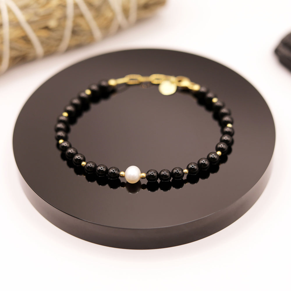 
                  
                    Pulsera Turmalina Negra Perla
                  
                