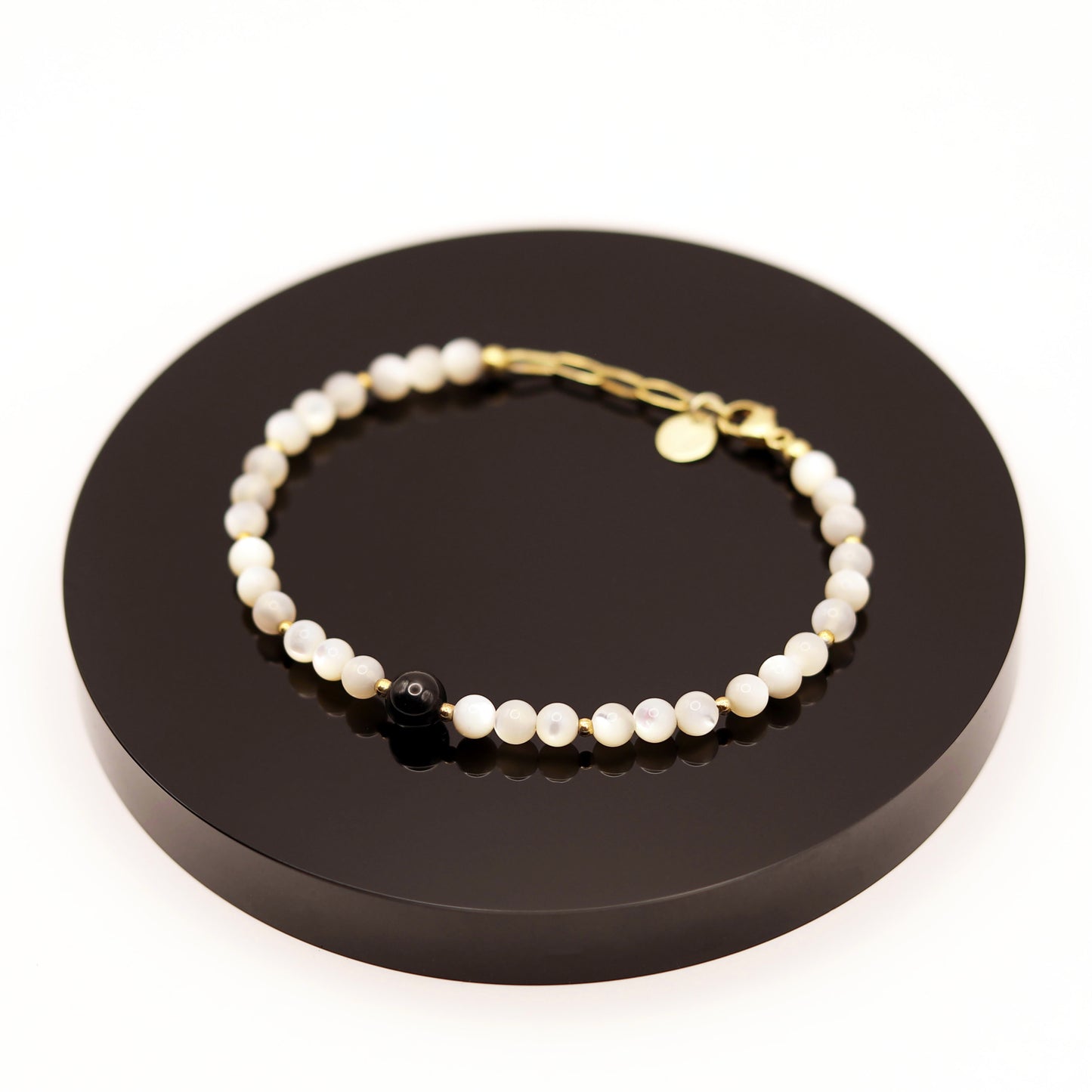 
                  
                    Pulsera Turmalina y Nácar
                  
                